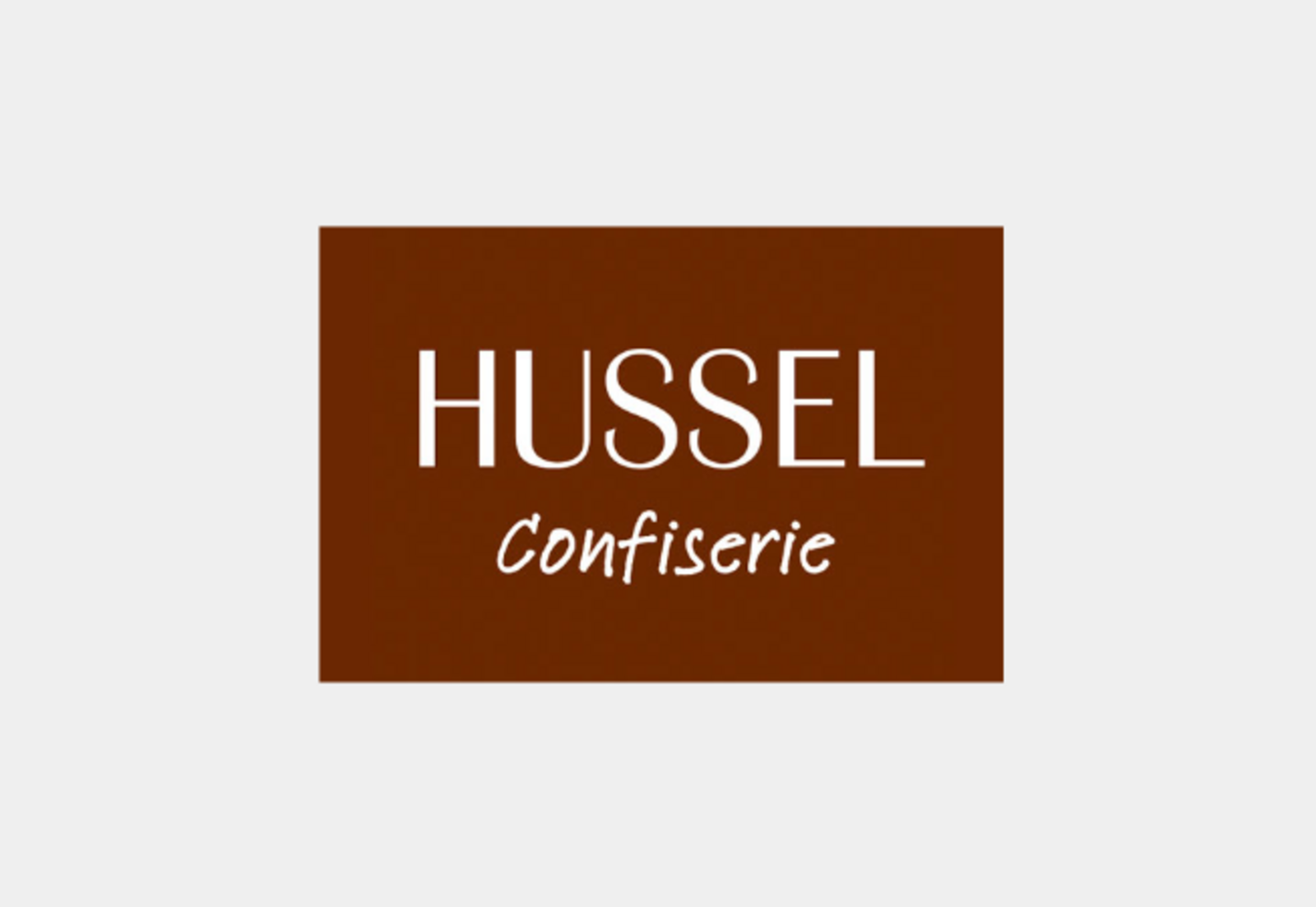 Das Hussel Logo in braun